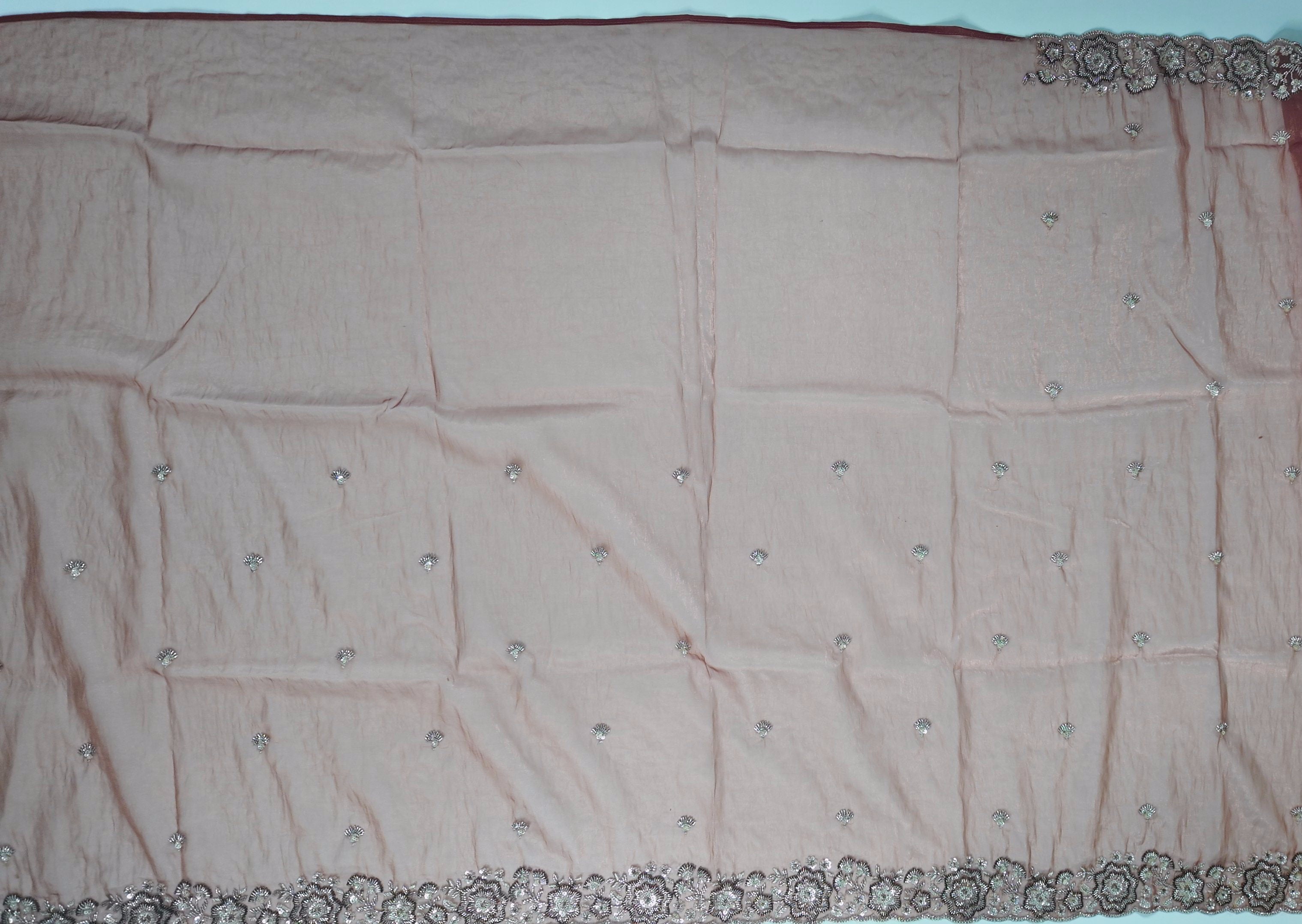 Embroidered Rust Silk Saree with Intricate Metallic Threadwork",