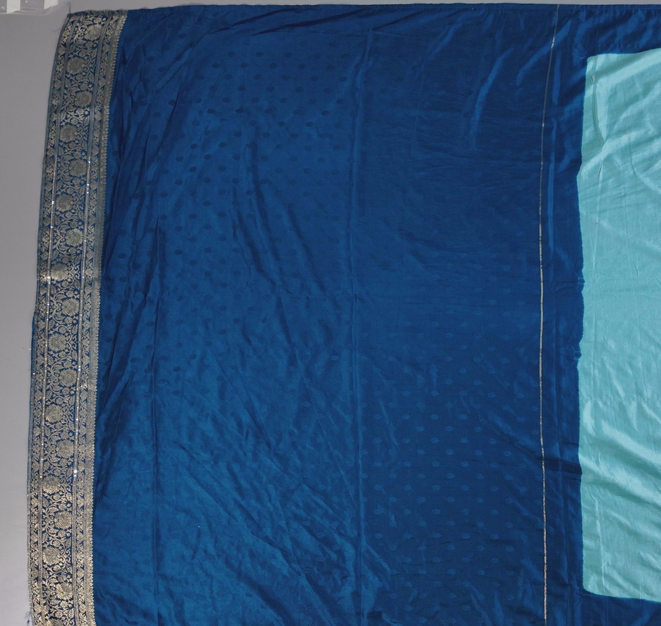 Ethereal Aqua Blue Brocade Saree with Intricate Silver Motifs",