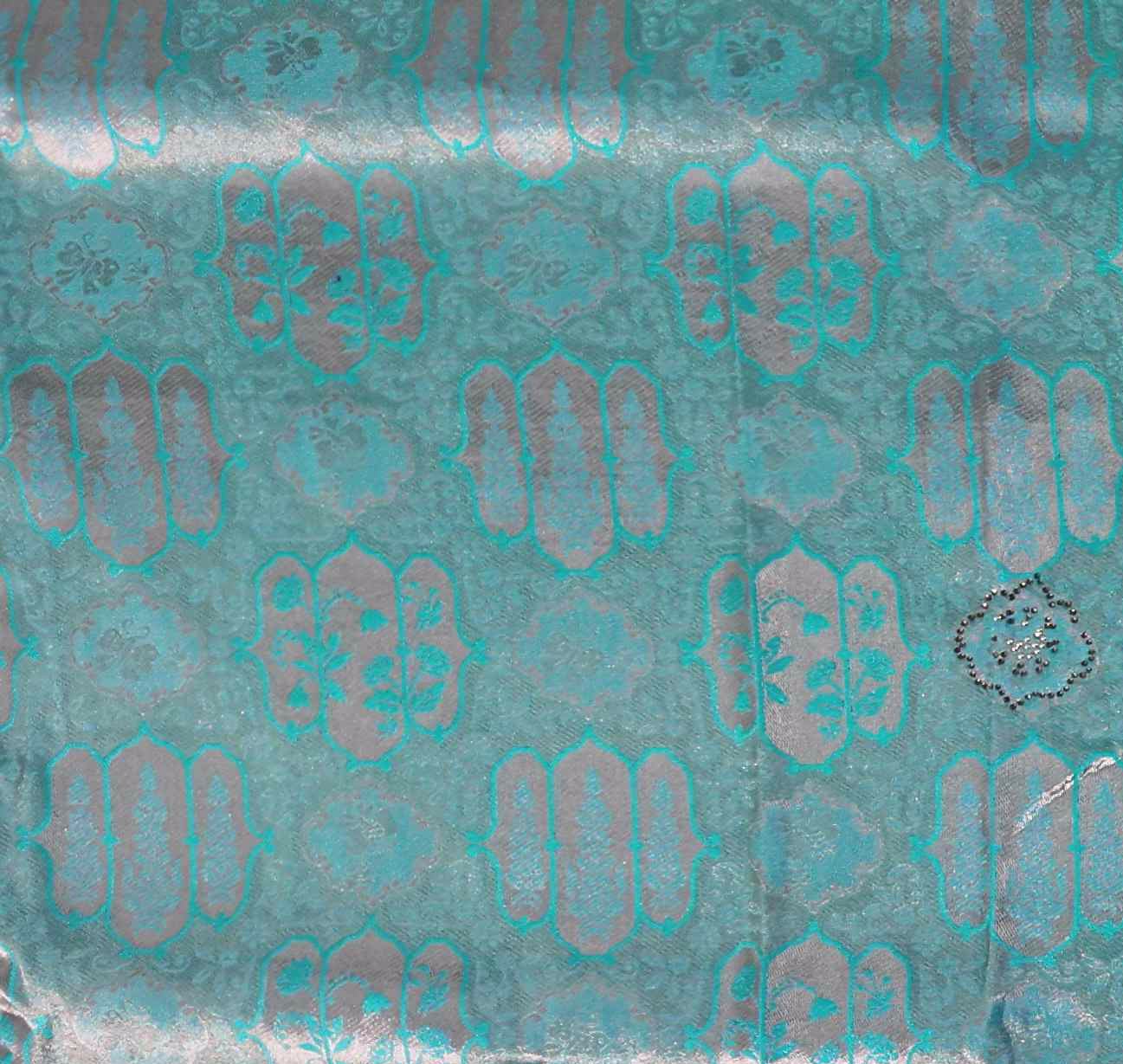 Icy Teal Ethnic Charm: Intricate Patterned Saree",