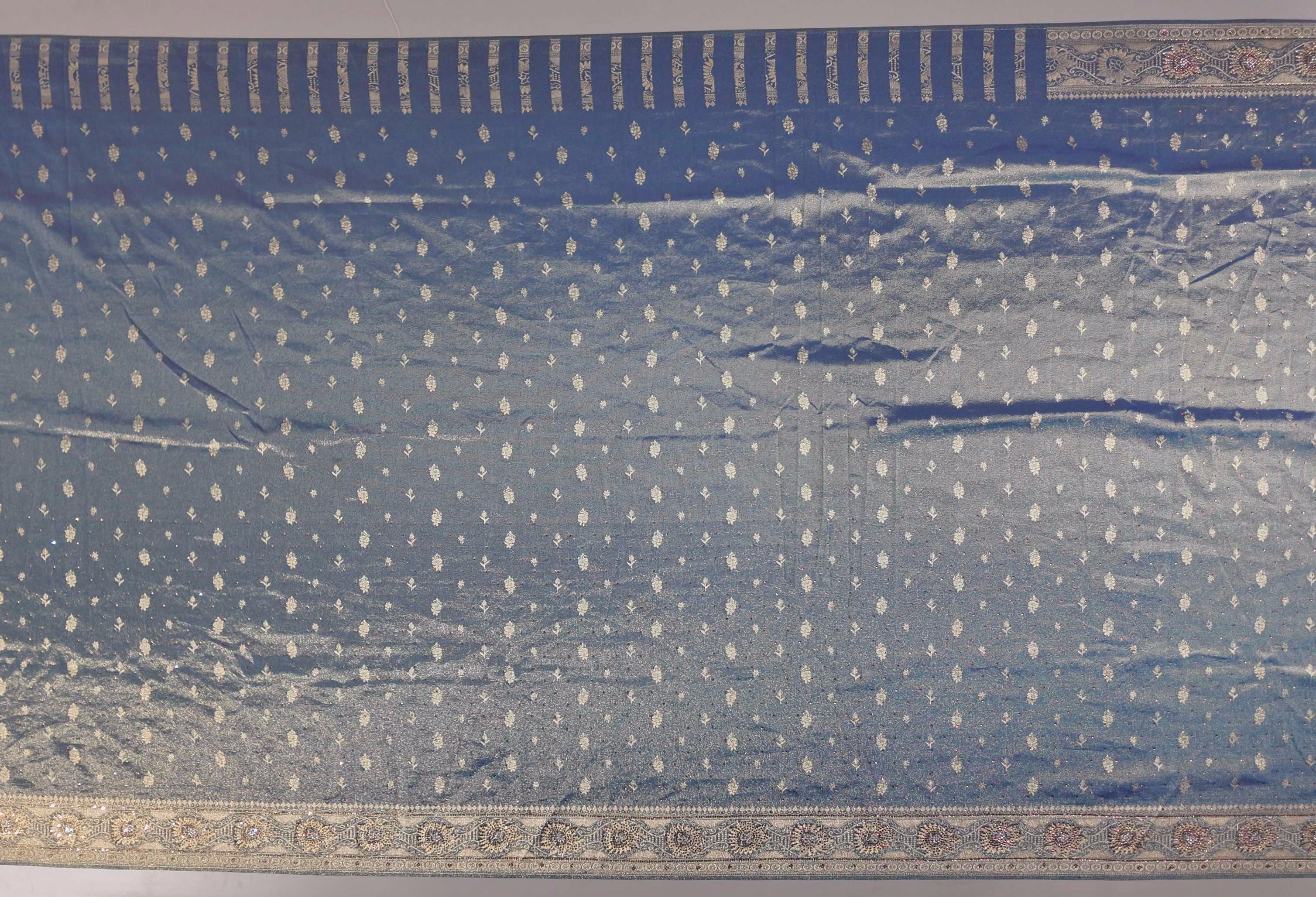 Enchanting Teal Banarasi Saree with Intricate Zari Details",