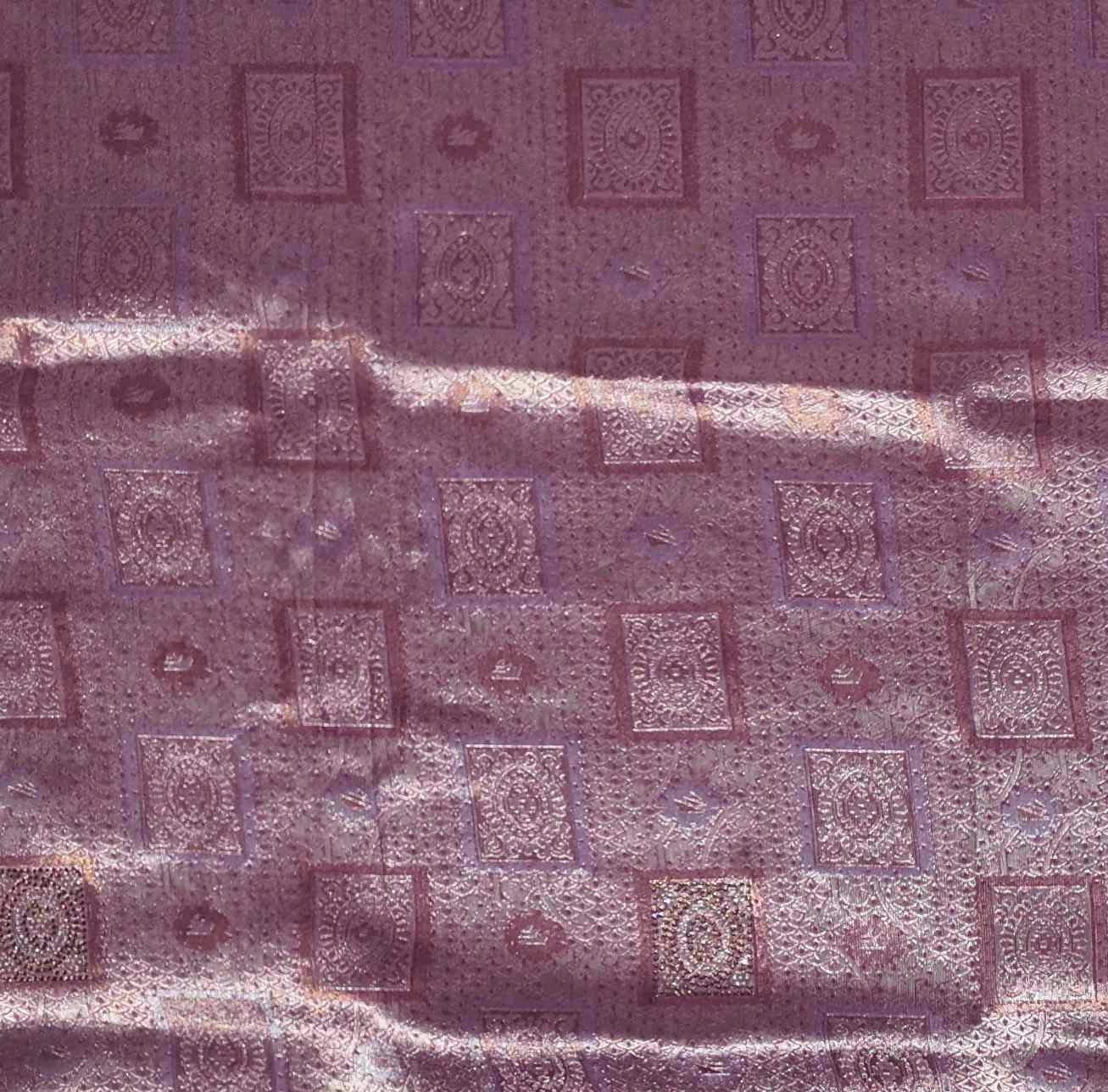 Radiant Maroon Tapestry Saree with Intricate Patterns",