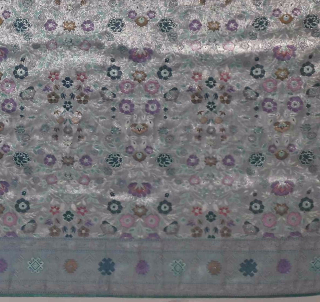 Opulent Silver & Teal Tapestry Saree with Intricate Mosaic Patterns",