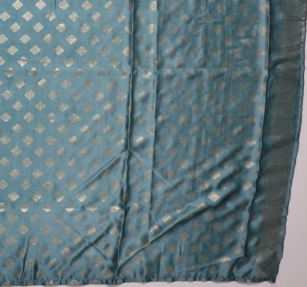 Seafoam Dreams: Luxurious Silk Saree with Intricate Motifs",