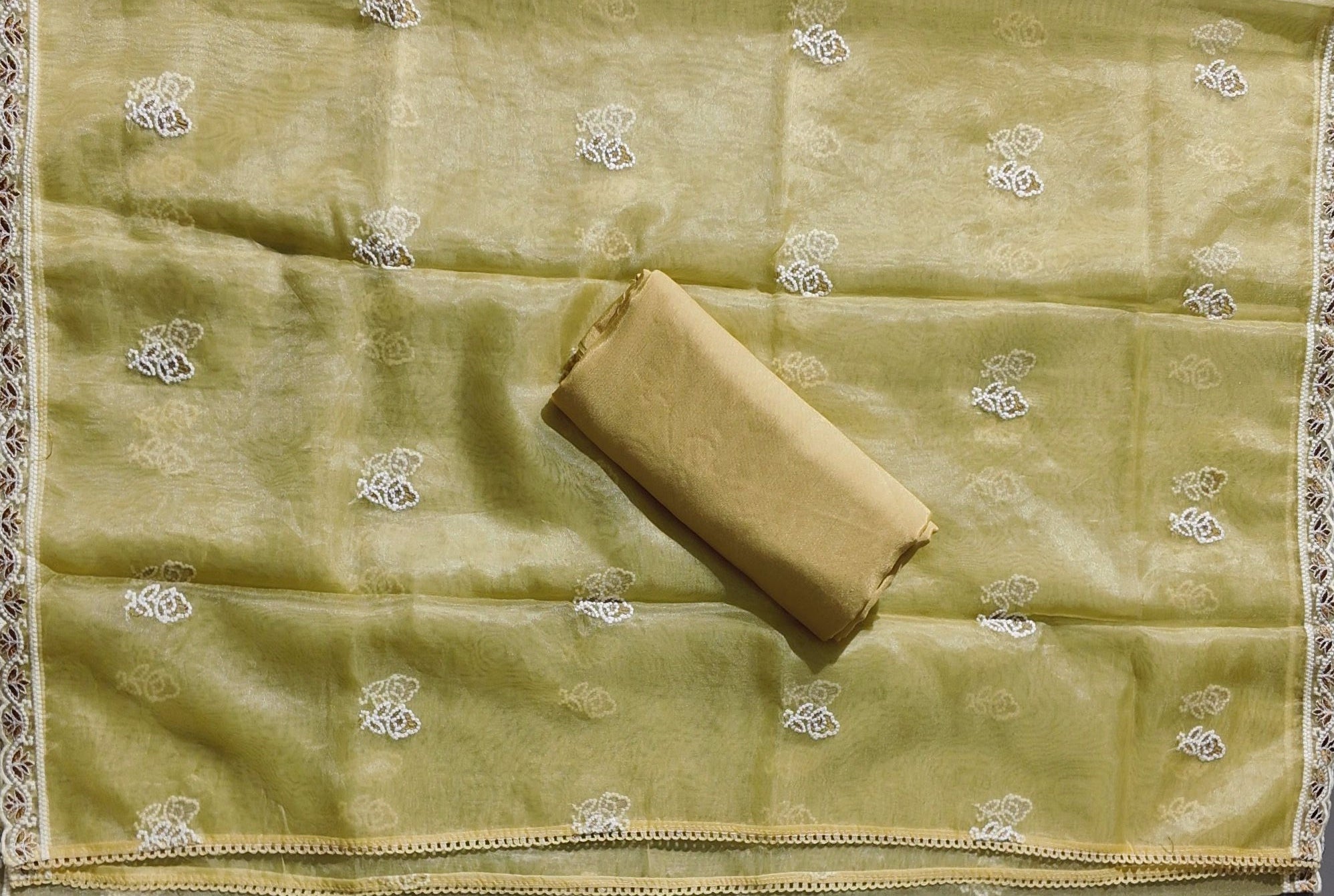 Sun-Kissed Charm: Exquisite Floral Embroidered Unstitched Suit",