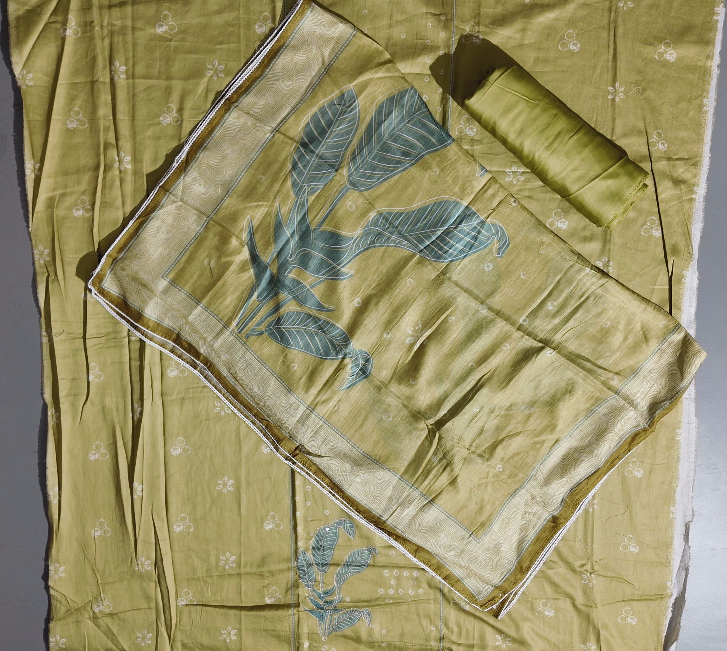 Serene Sage Unstitched Attire with Artful Leaf Embroidery",