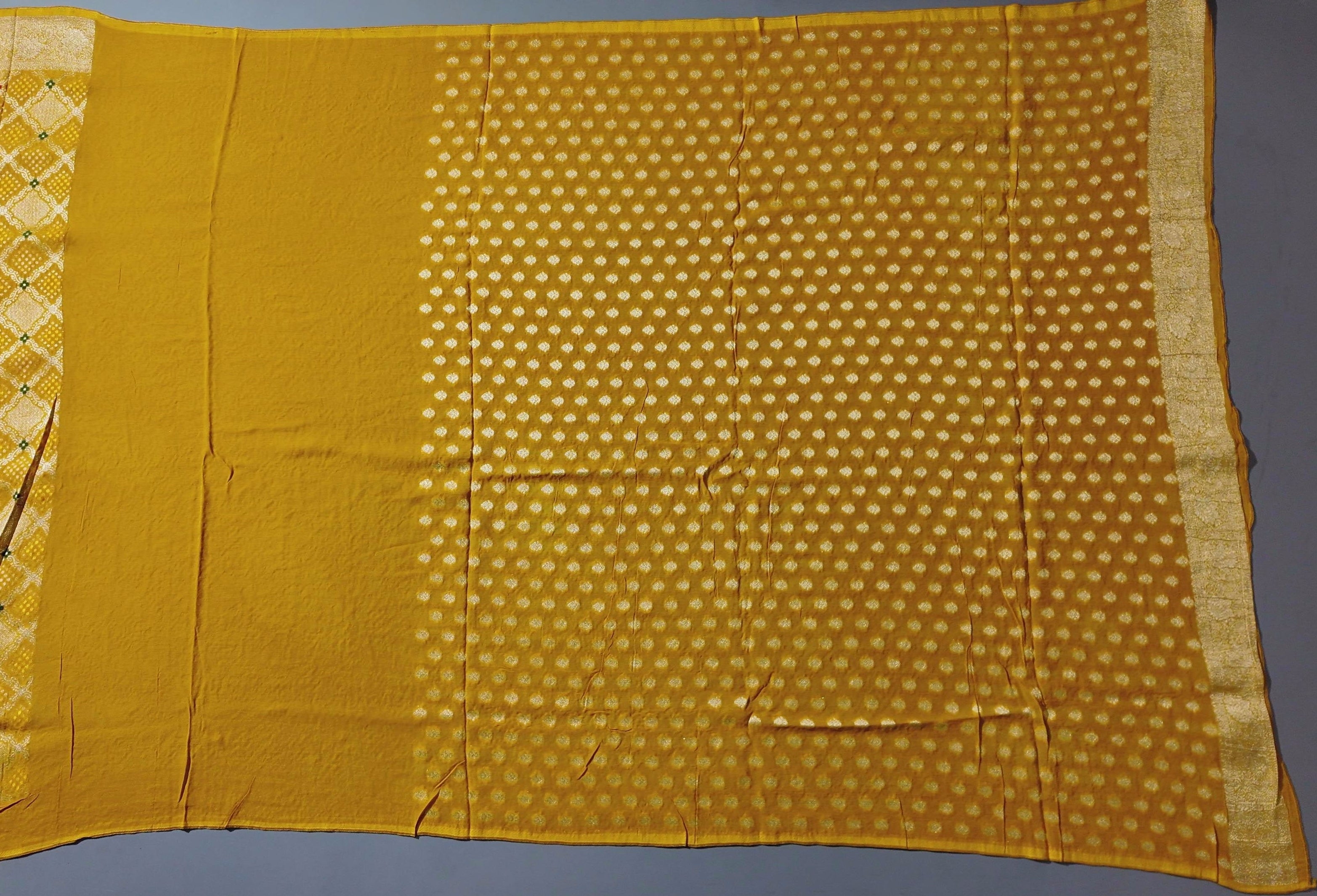 Radiant Mustard Unstitched Suit with Intricate Motifs",