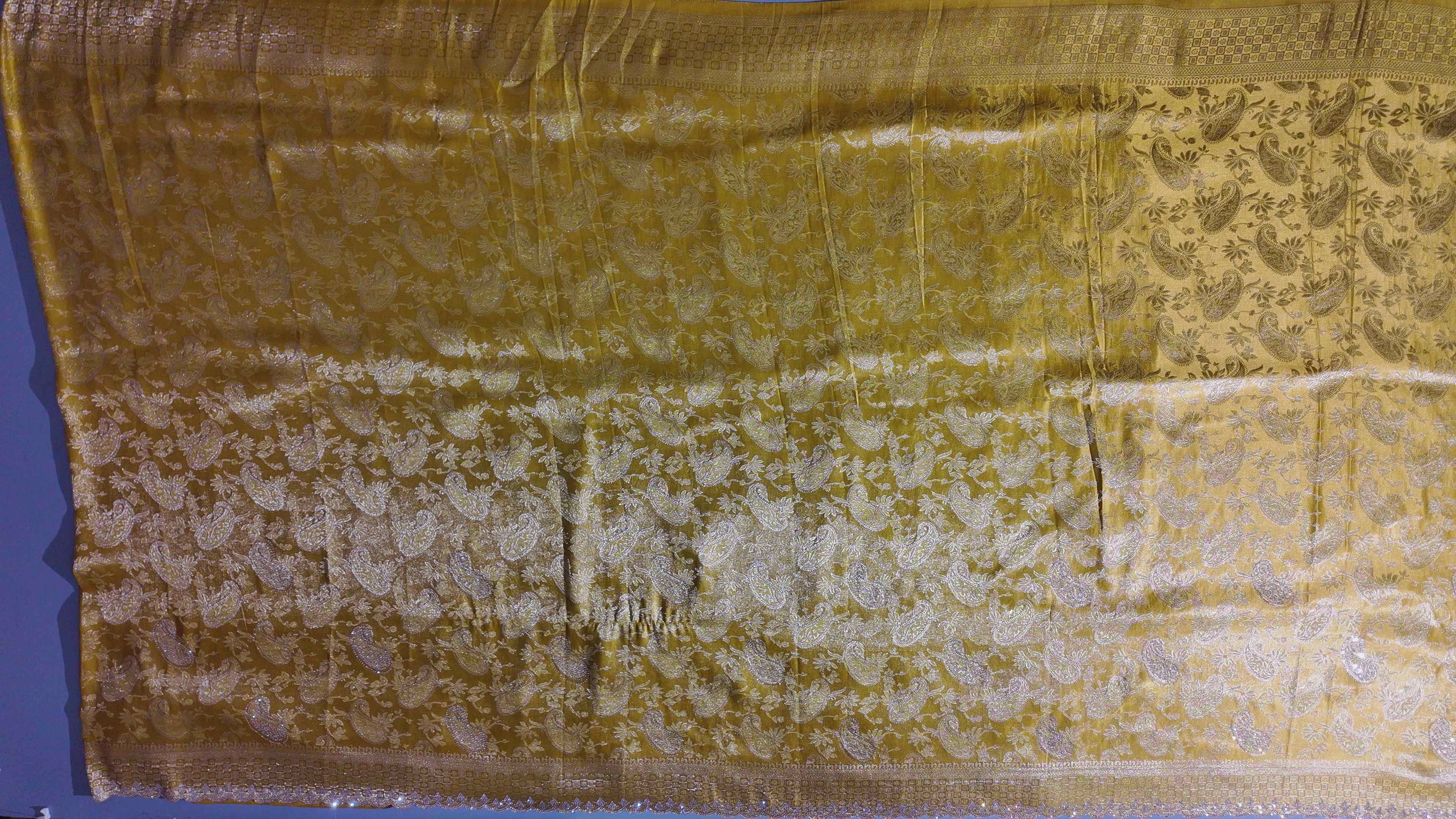 Golden Aura Unstitched Suit: Radiate Glamour on Festive Days",