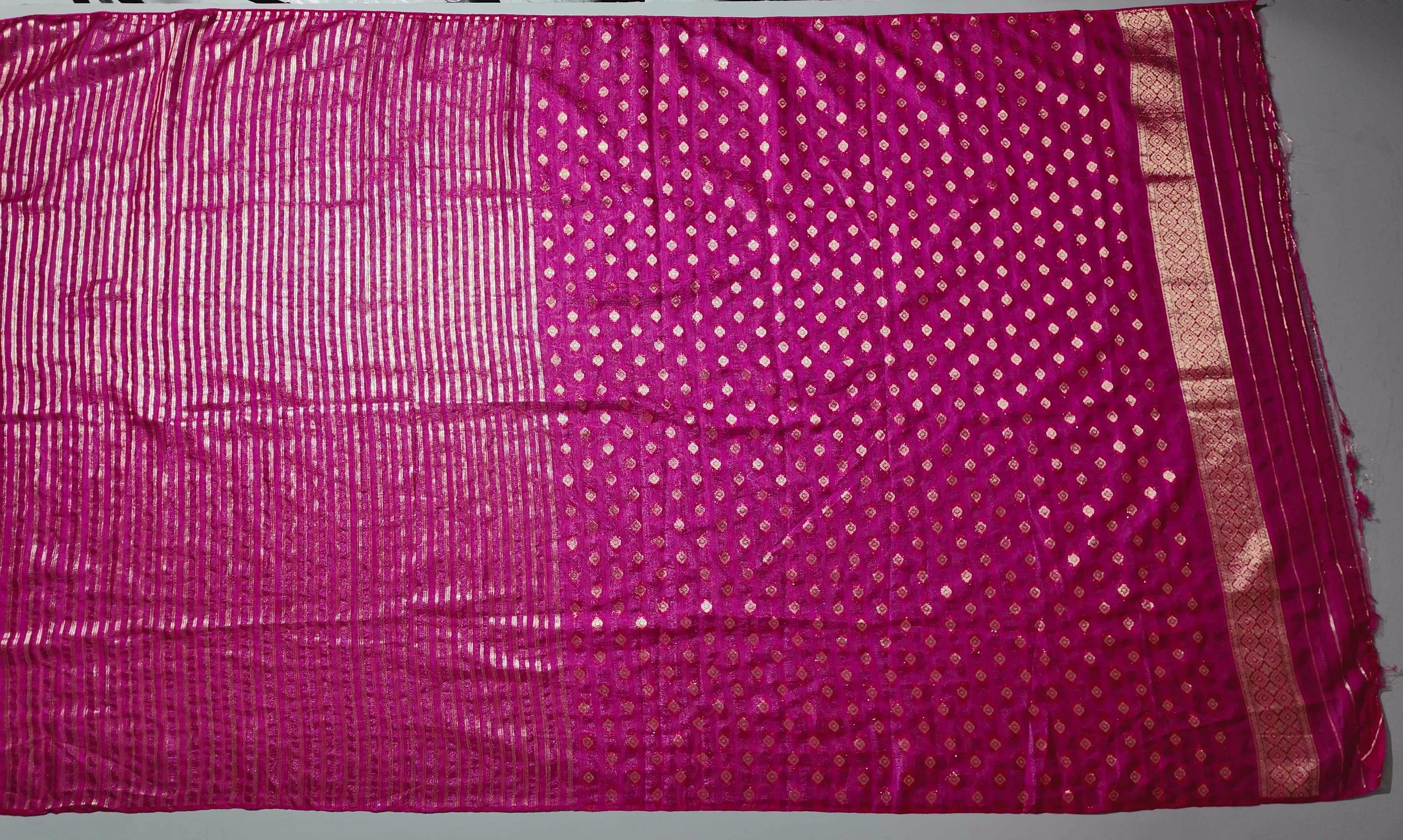 Opulent Ruby Red Saree with Intricate Golden Embroidery",