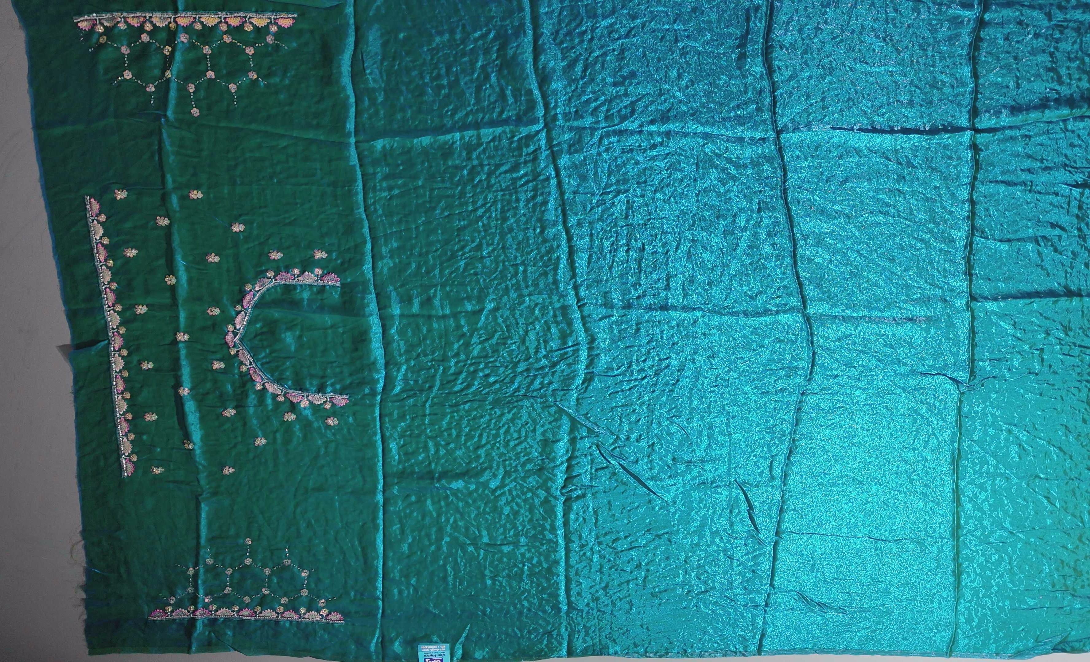 Radiant Teal Dream: Embroidered Floral Extravaganza Saree",