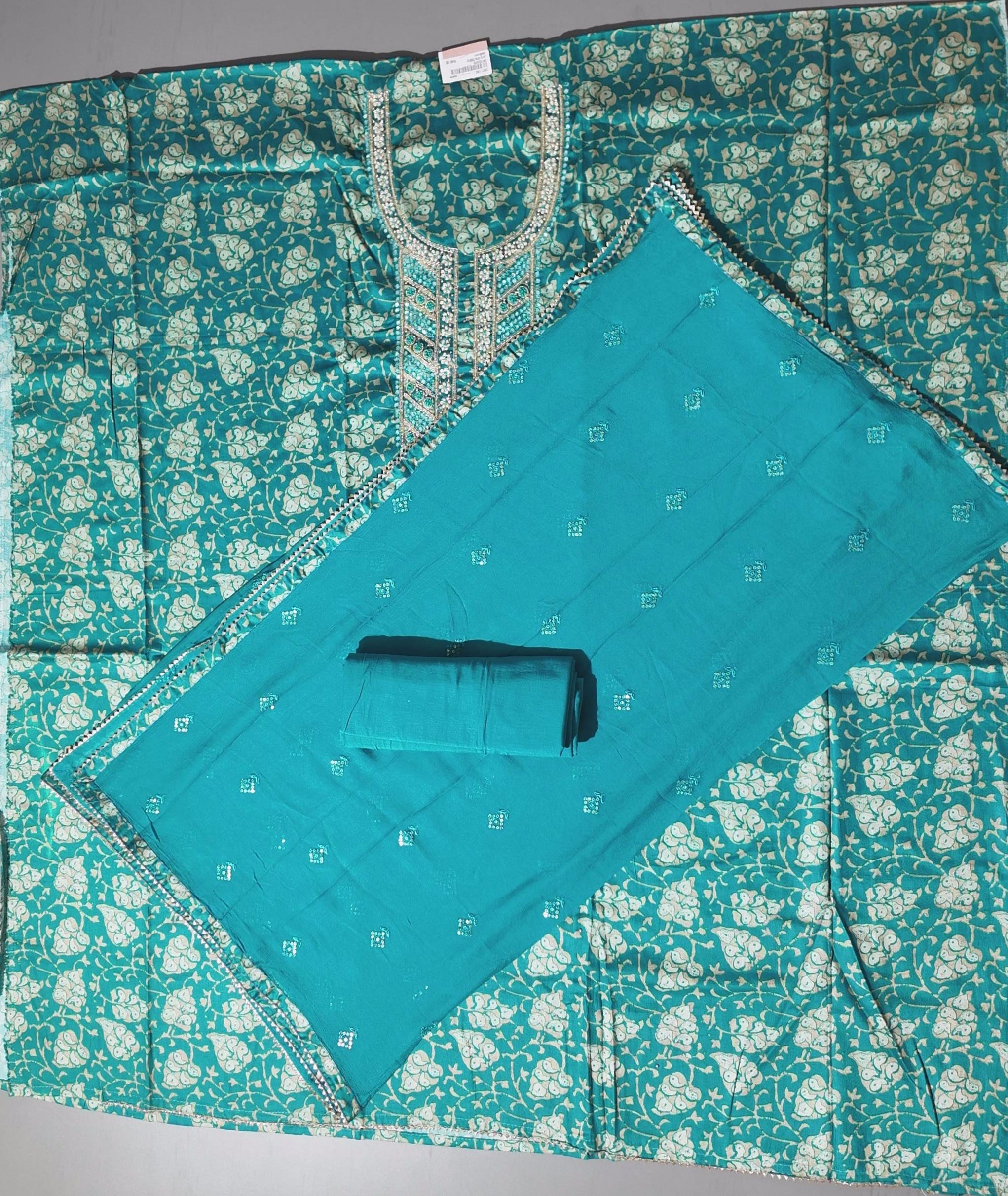 Opulent Teal Brocade Unstitched Suit with Intricate Embellishments