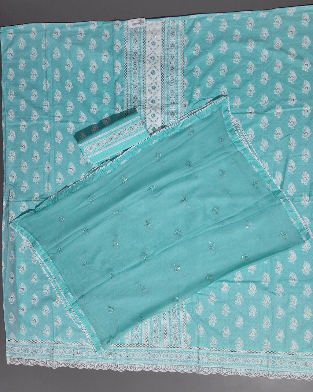 Aqua Glimpse: Enchanting Unstitched Suit for Timeless Grace