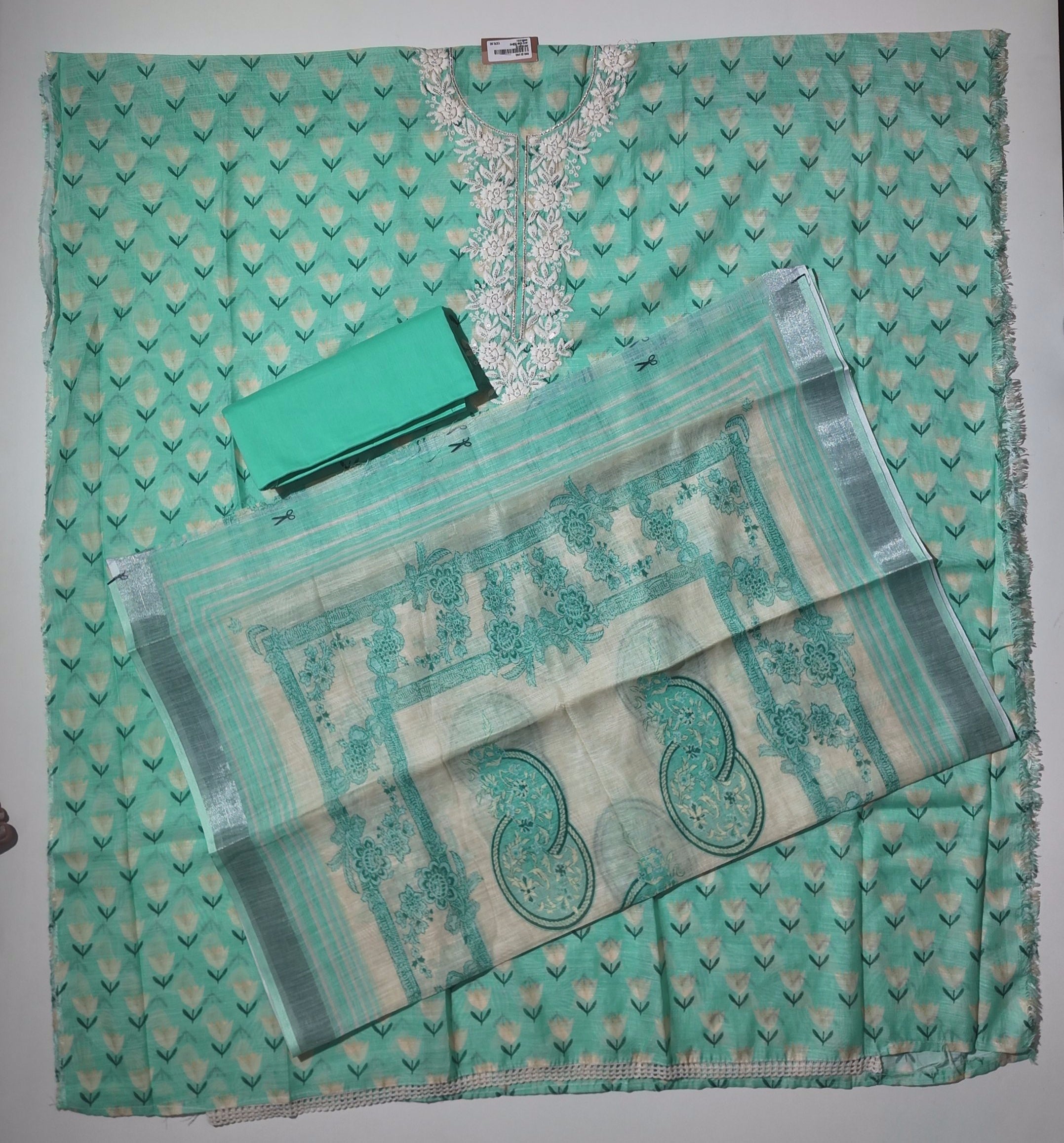 Aqua Blossom Embroidered Unstitched Suit - Perfect for Festive Flair",