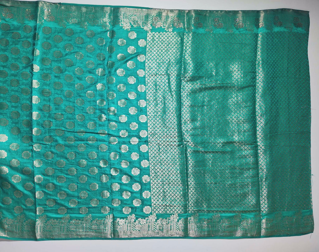 Teal Radiance: Handcrafted Banarasi Silk Saree",