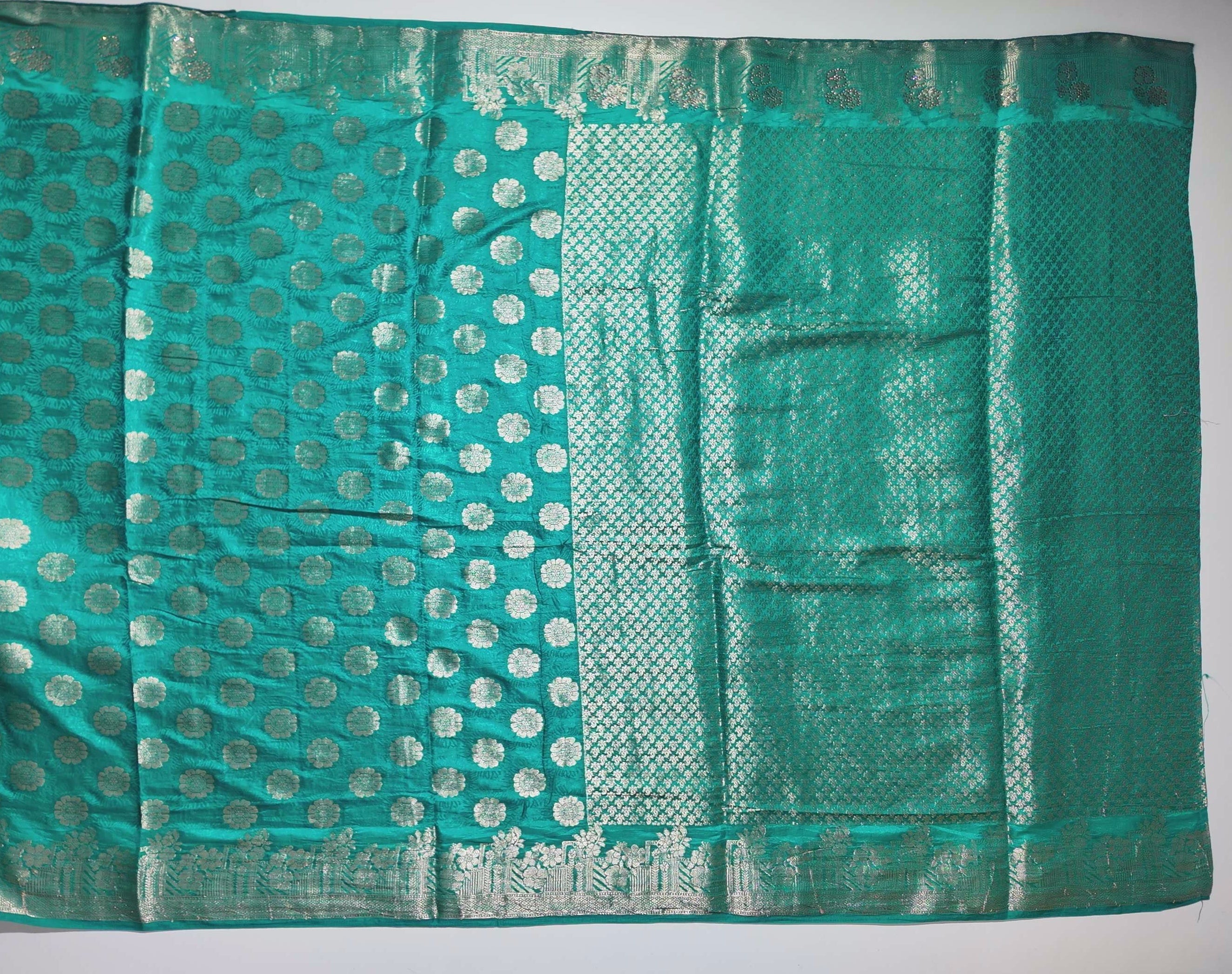 Teal Radiance: Handcrafted Banarasi Silk Saree",