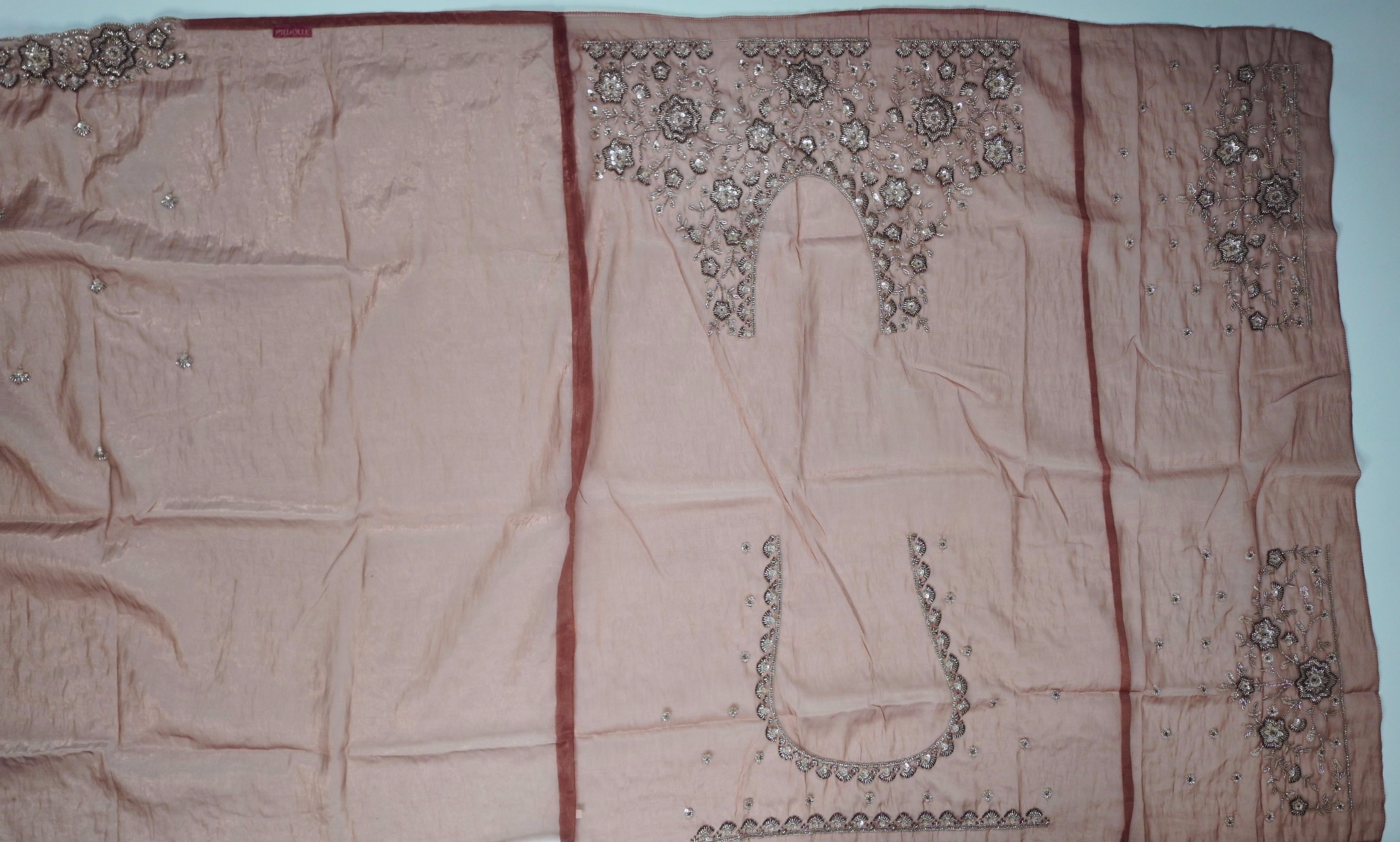 Embroidered Rust Silk Saree with Intricate Metallic Threadwork",
