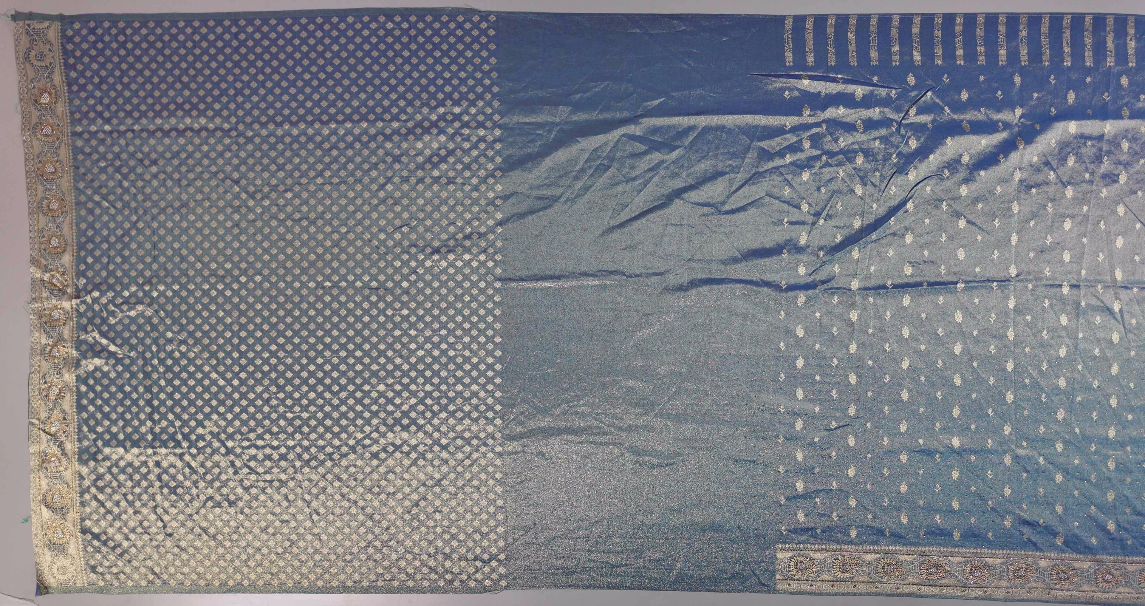 Enchanting Teal Banarasi Saree with Intricate Zari Details",