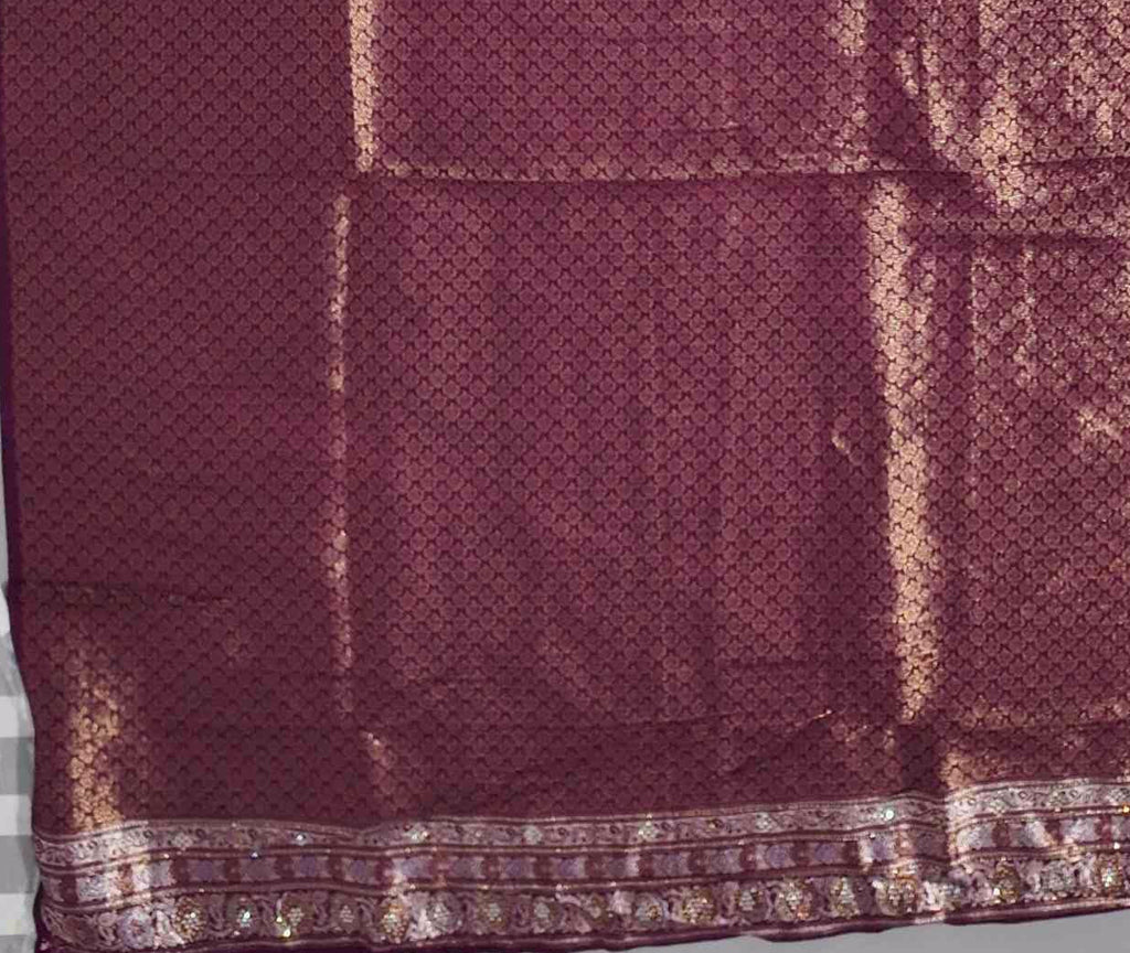 Radiant Maroon Tapestry Saree with Intricate Patterns",