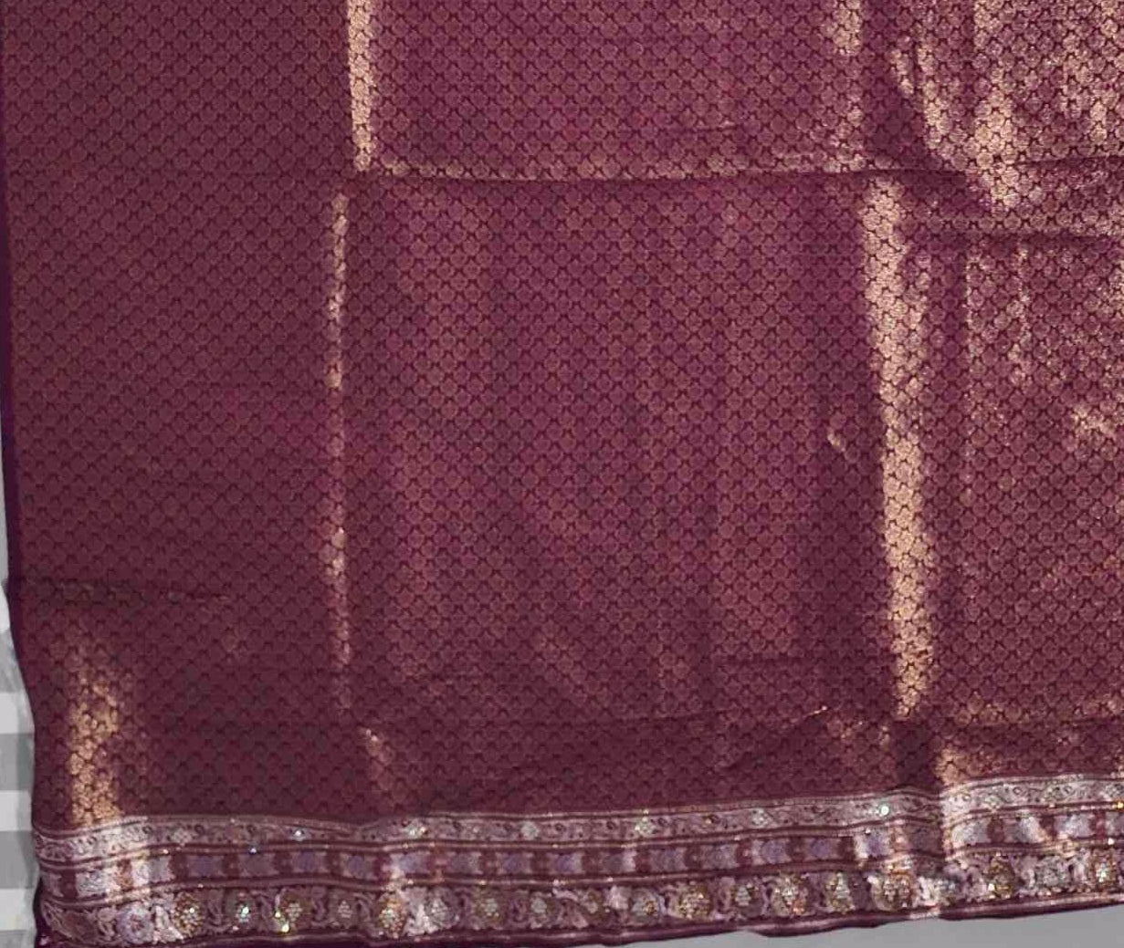 Radiant Maroon Tapestry Saree with Intricate Patterns",