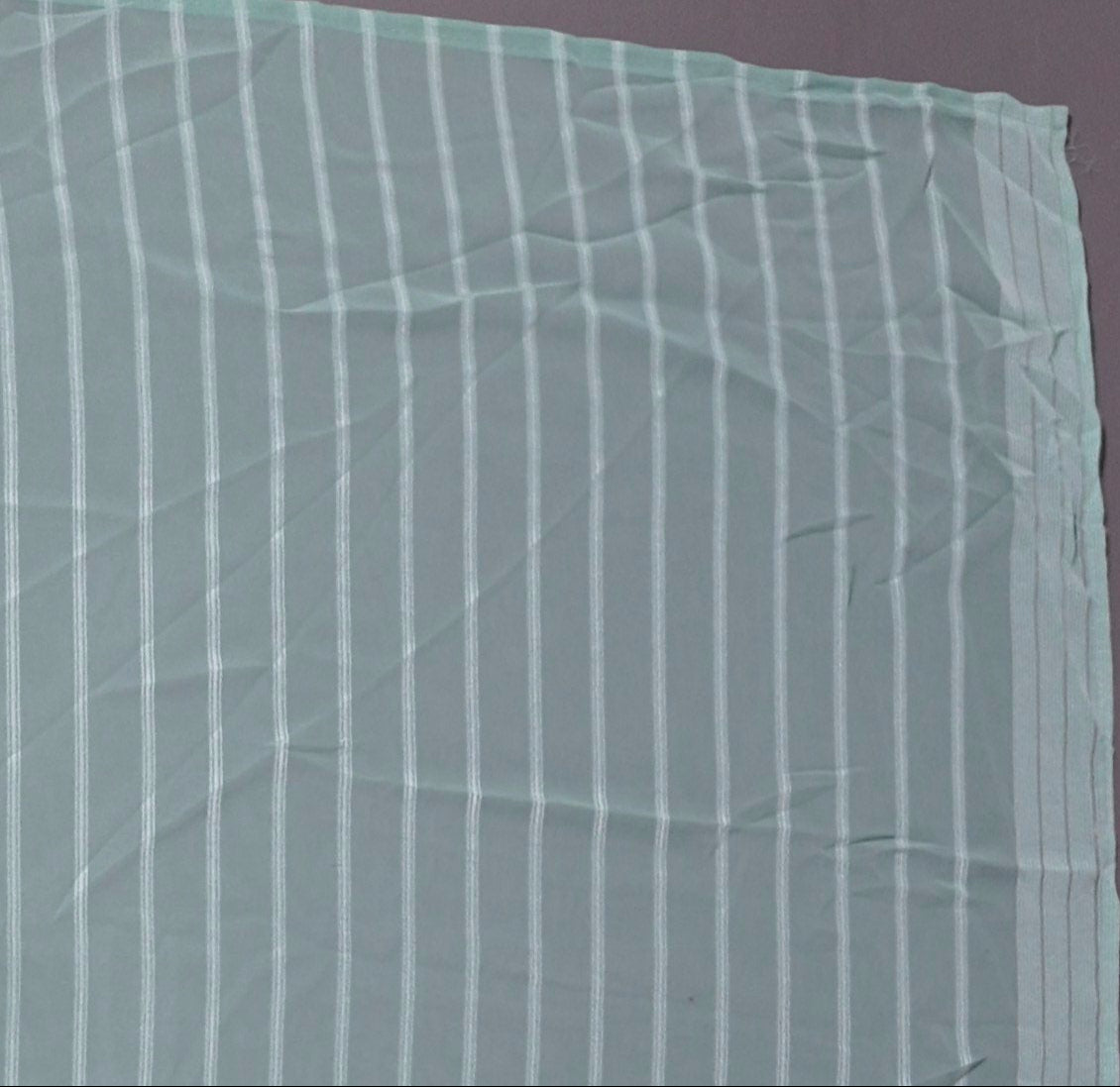 Aqua Luster: Luxe Striped Shimmer Saree",