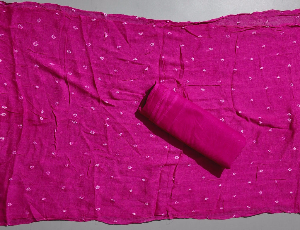 Vibrant Fuchsia Symphony: Unstitched Suit for Festive Flair",