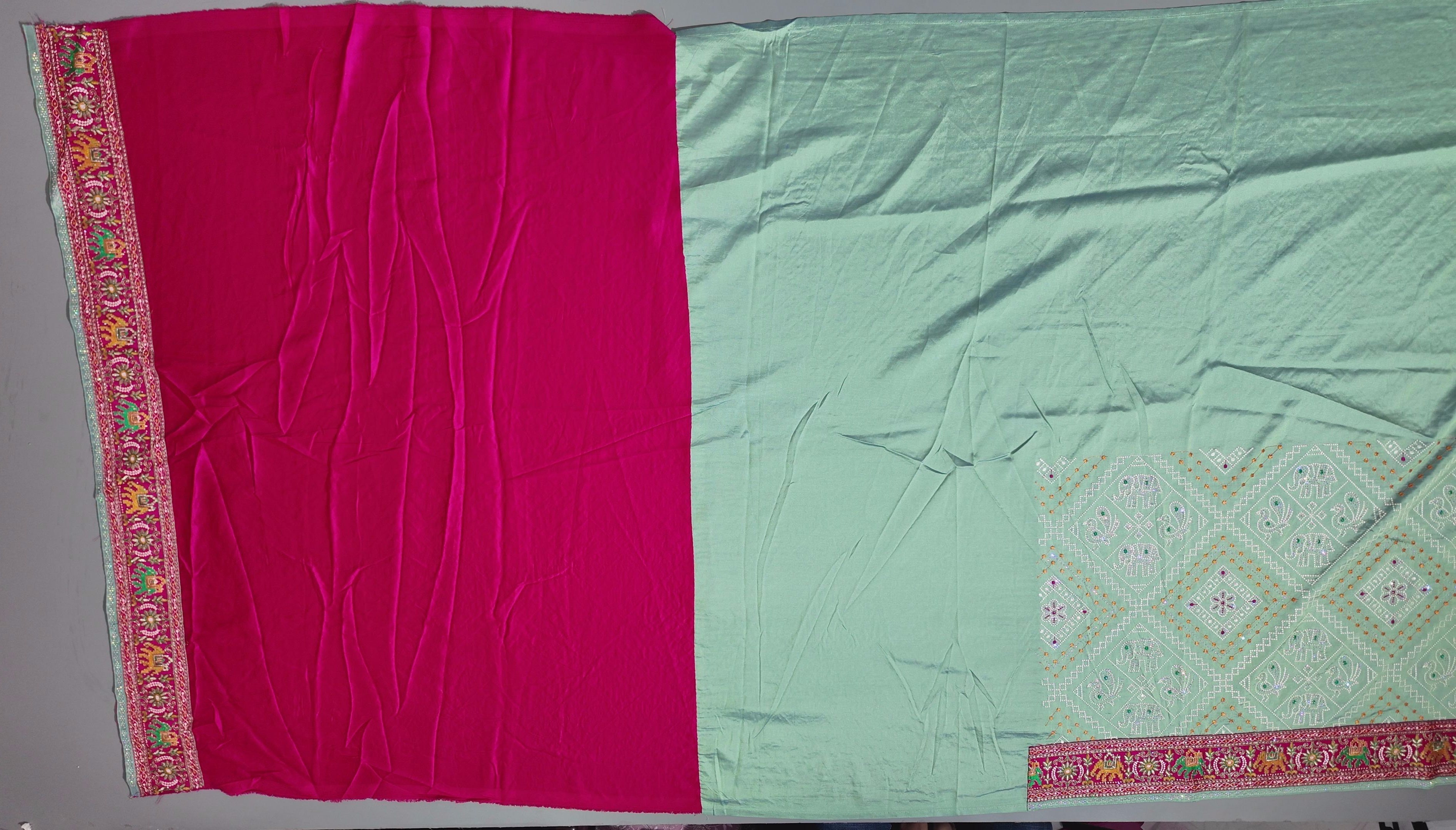 Festive Radiance: Vibrant Embroidered Silk Saree",