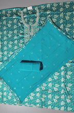 Opulent Teal Brocade Unstitched Suit with Intricate Embellishments
