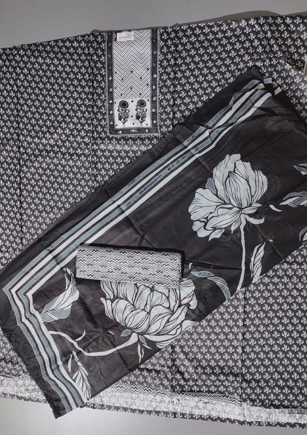 Monochrome Majestic: Unstitched Ensemble with Intricate Floral Designs
