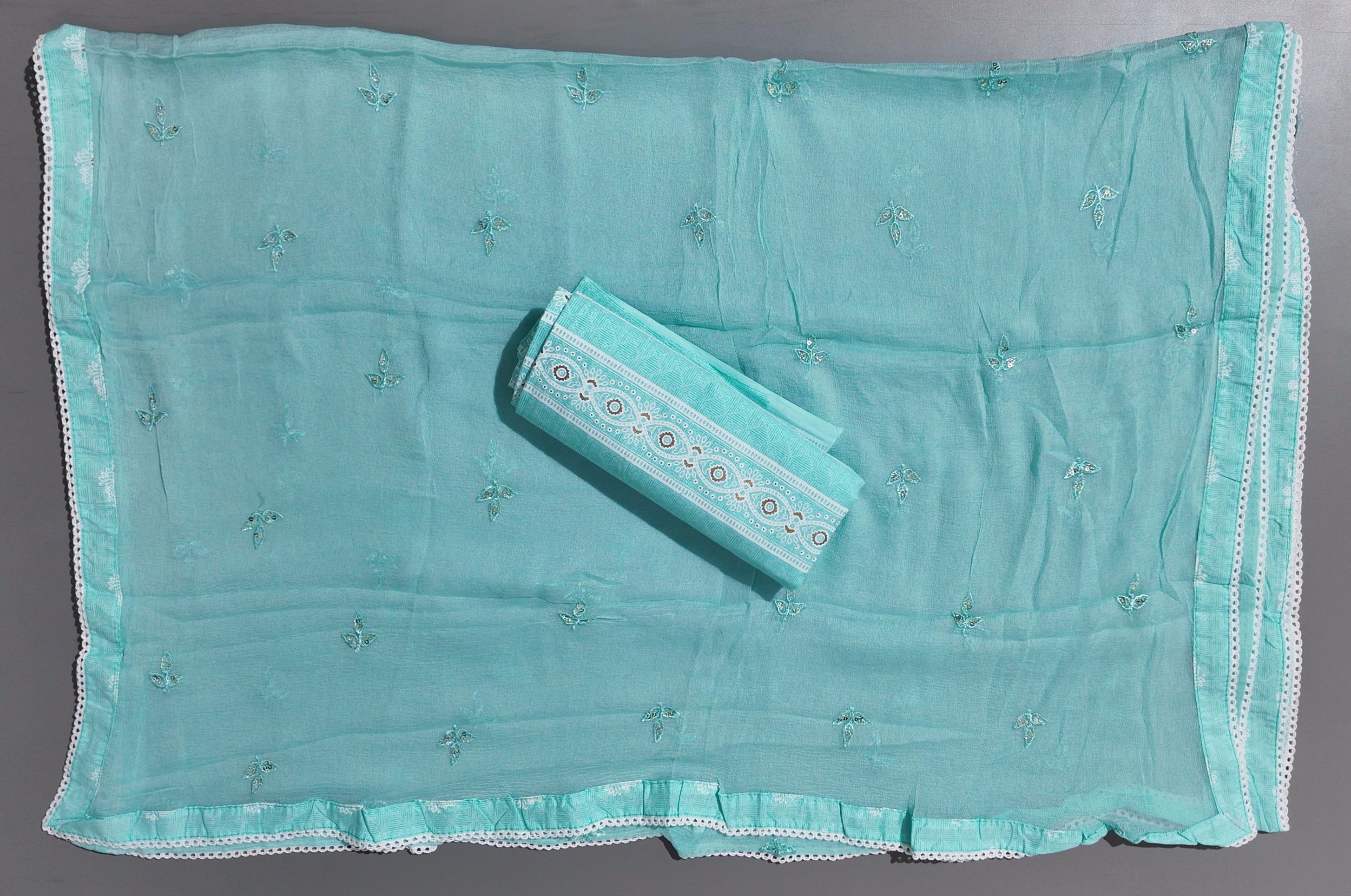 Aqua Glimpse: Enchanting Unstitched Suit for Timeless Grace