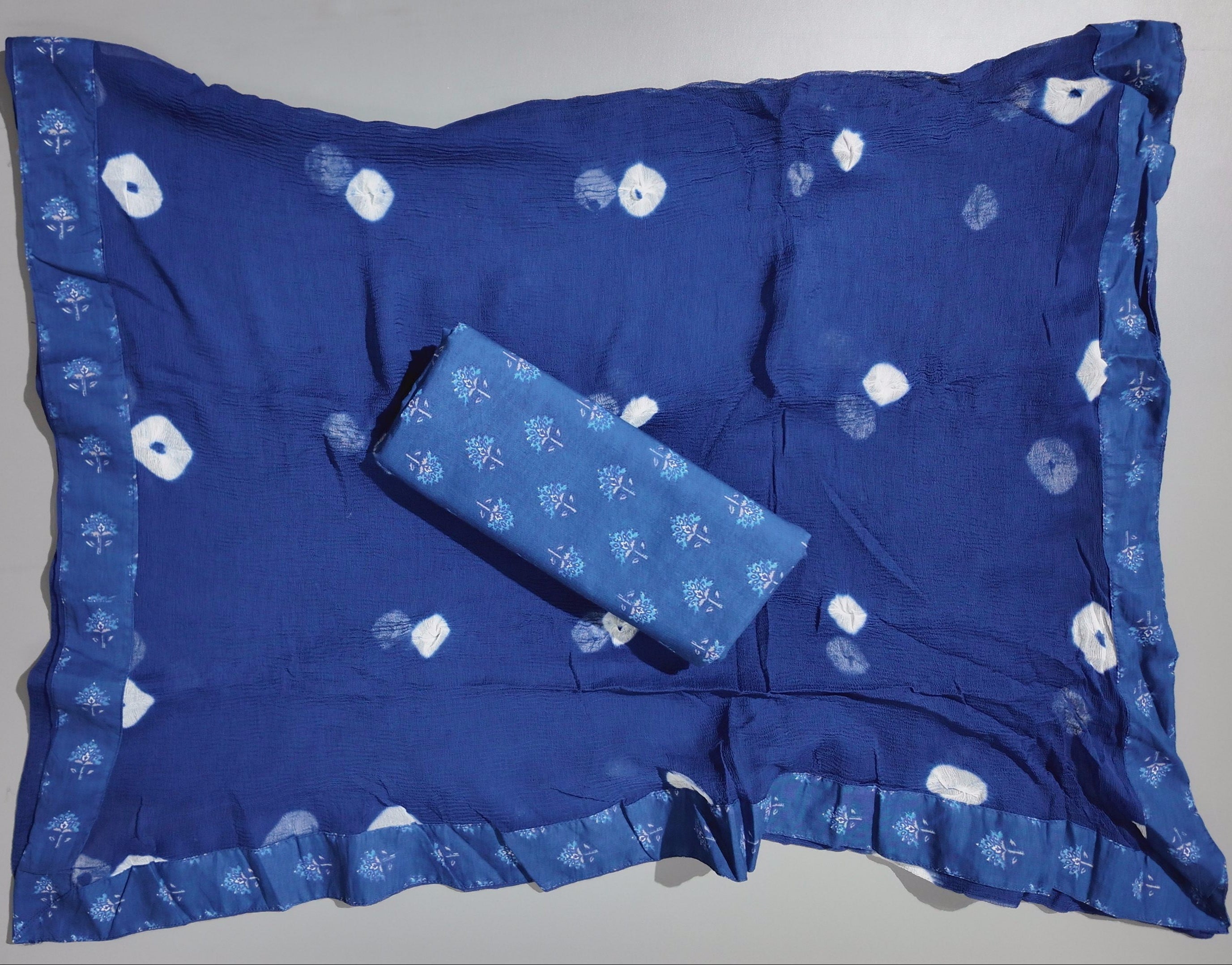 Azure Blossom Unstitched Suit: Craft Your Style