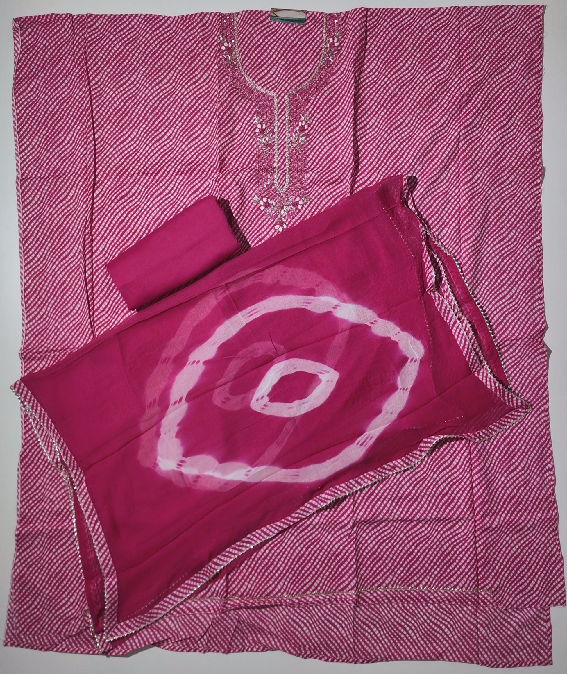Vibrant Fuchsia Gleam: Embroidered Unstitched Suit Bliss