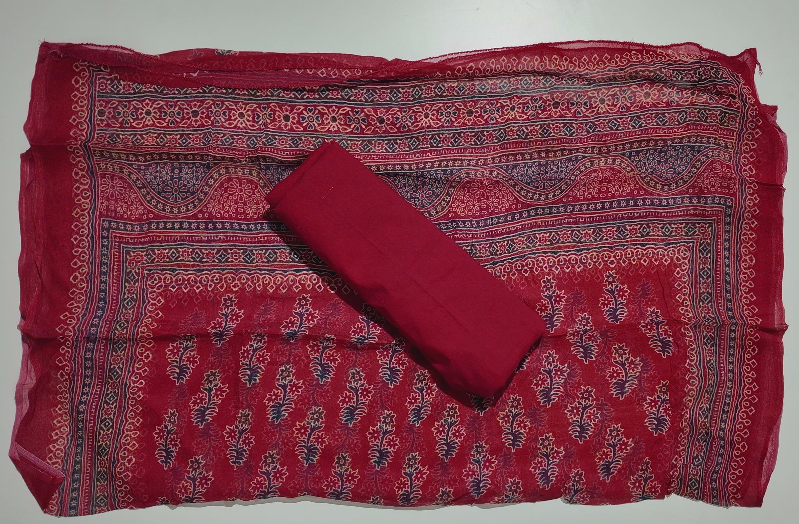 Vibrant Festive Flair: Unstitched Ethnic Suit for Celebrations",