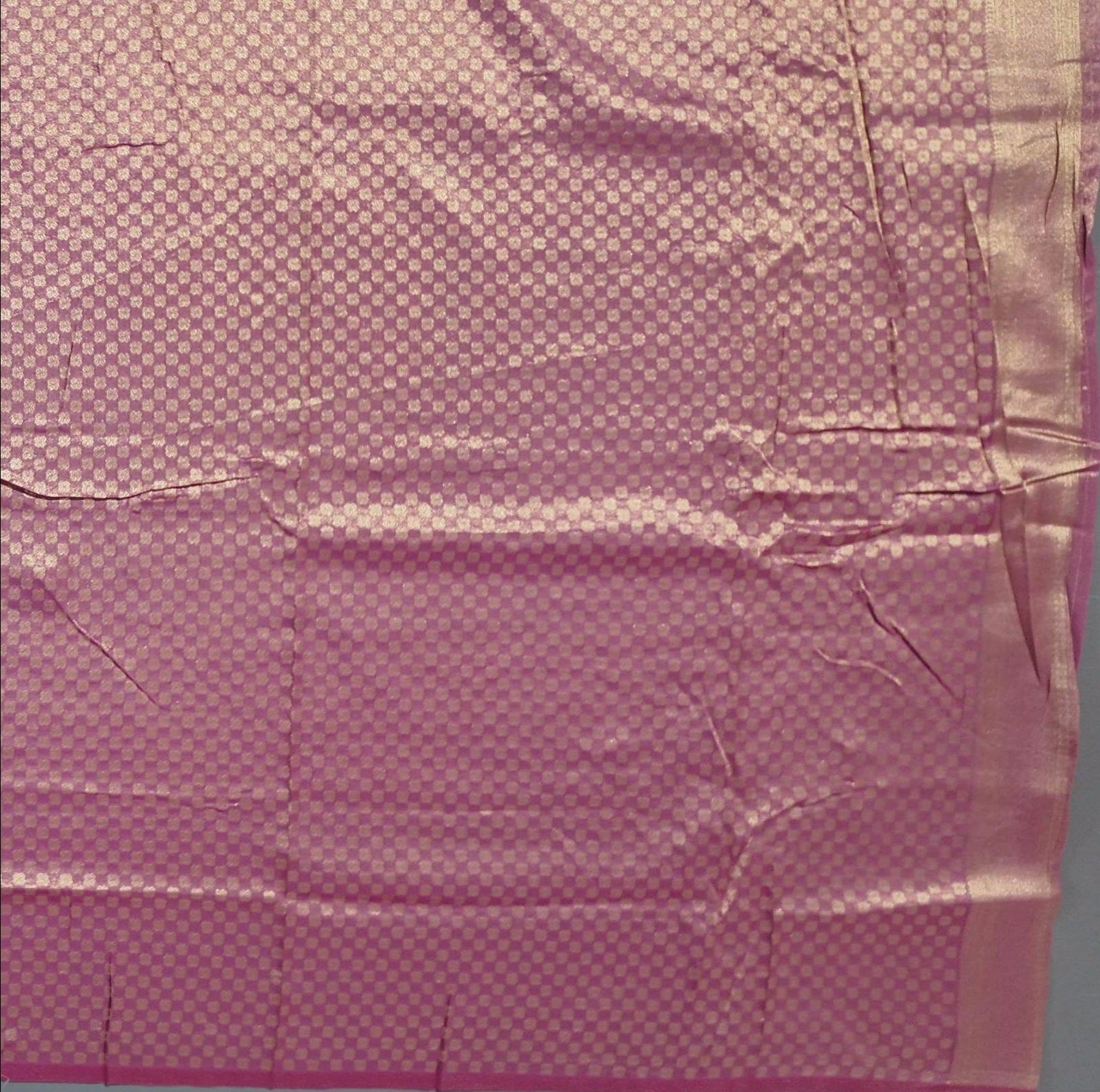 Majestic Pink Banarasi Silk Saree with Ornate Gold Woven Patterns",