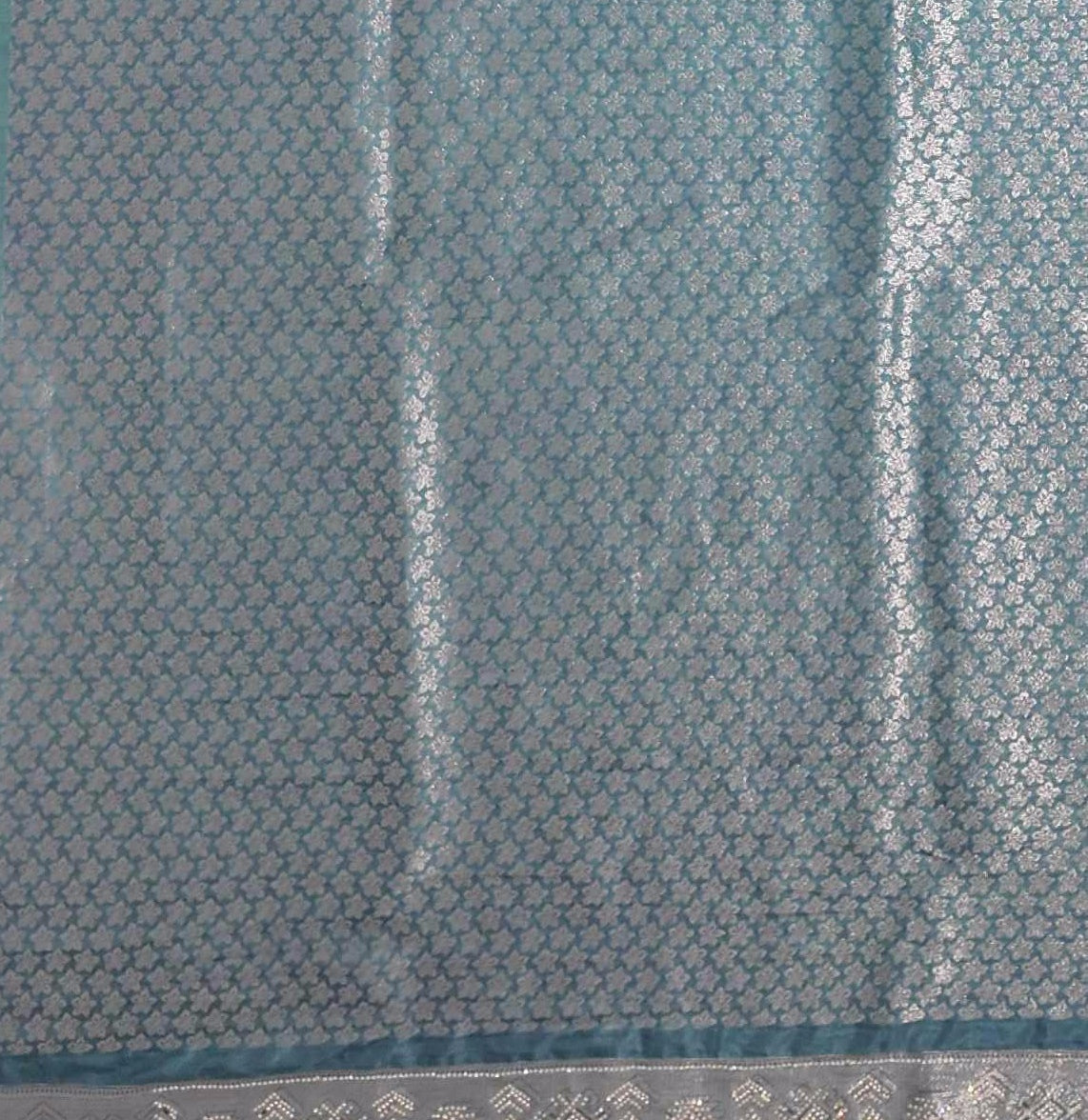 Opulent Celestial Weave: Intricately Embellished Saree",