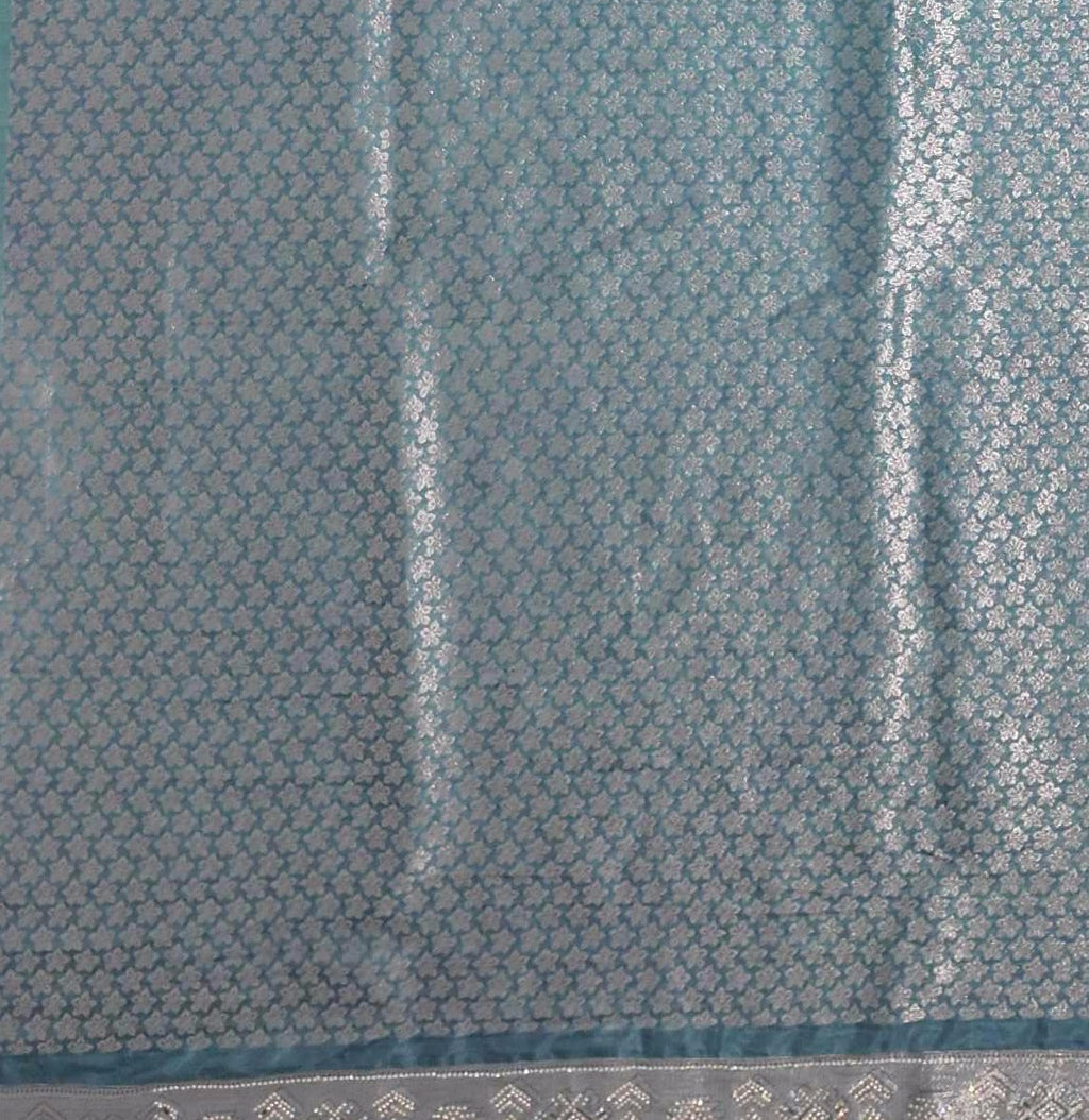 Opulent Silver & Teal Tapestry Saree with Intricate Mosaic Patterns",