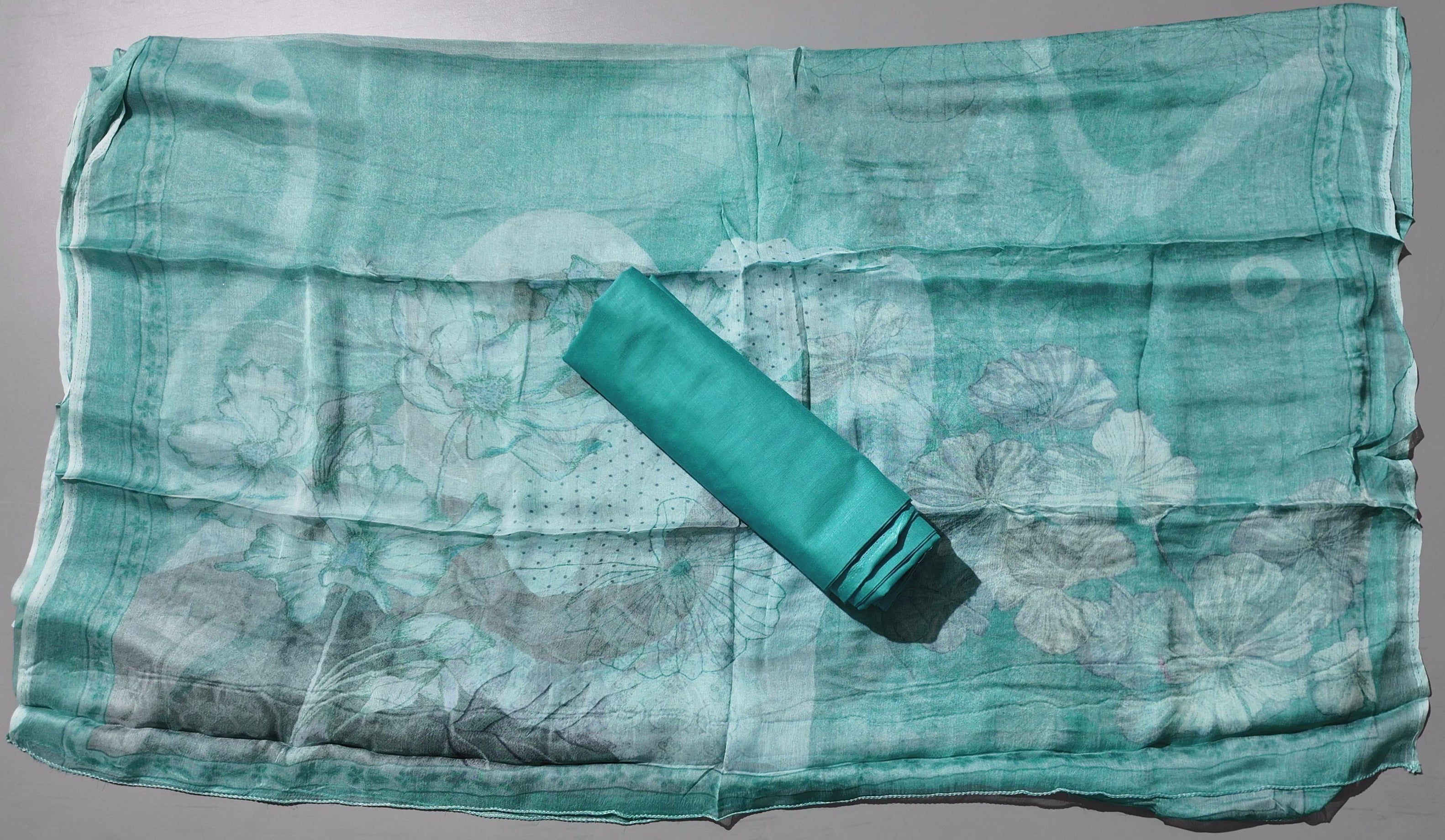 Serene Aqua Blossoms: Unstitched Suit with Intricate Lace